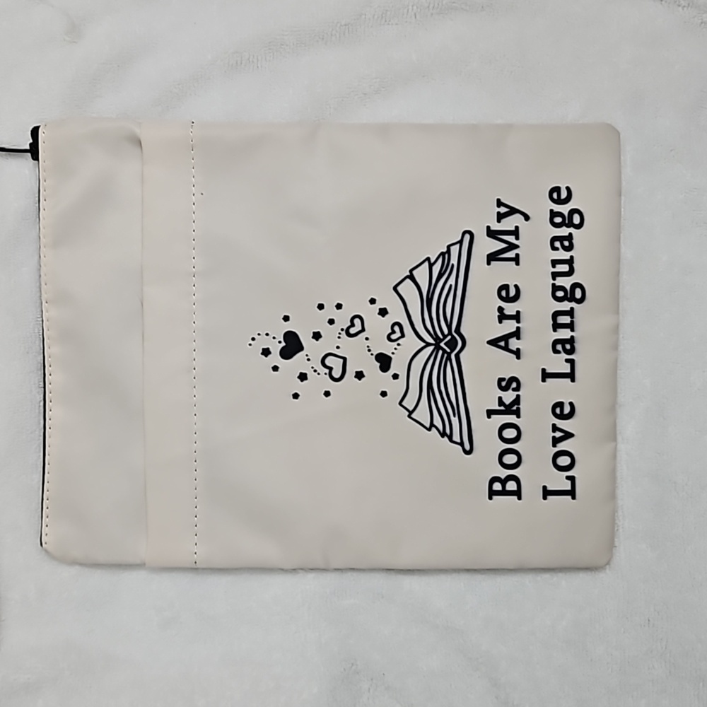 BOOK SLEEVE " BOOKS ARE MY LOVE LANGAUGE ON FRONT WITH ZIPPER TOP
